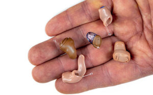 Who Takes Hearing Aids
